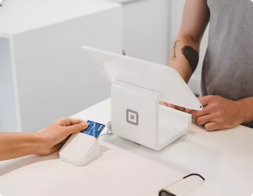 Online payment options on a laptop and phone